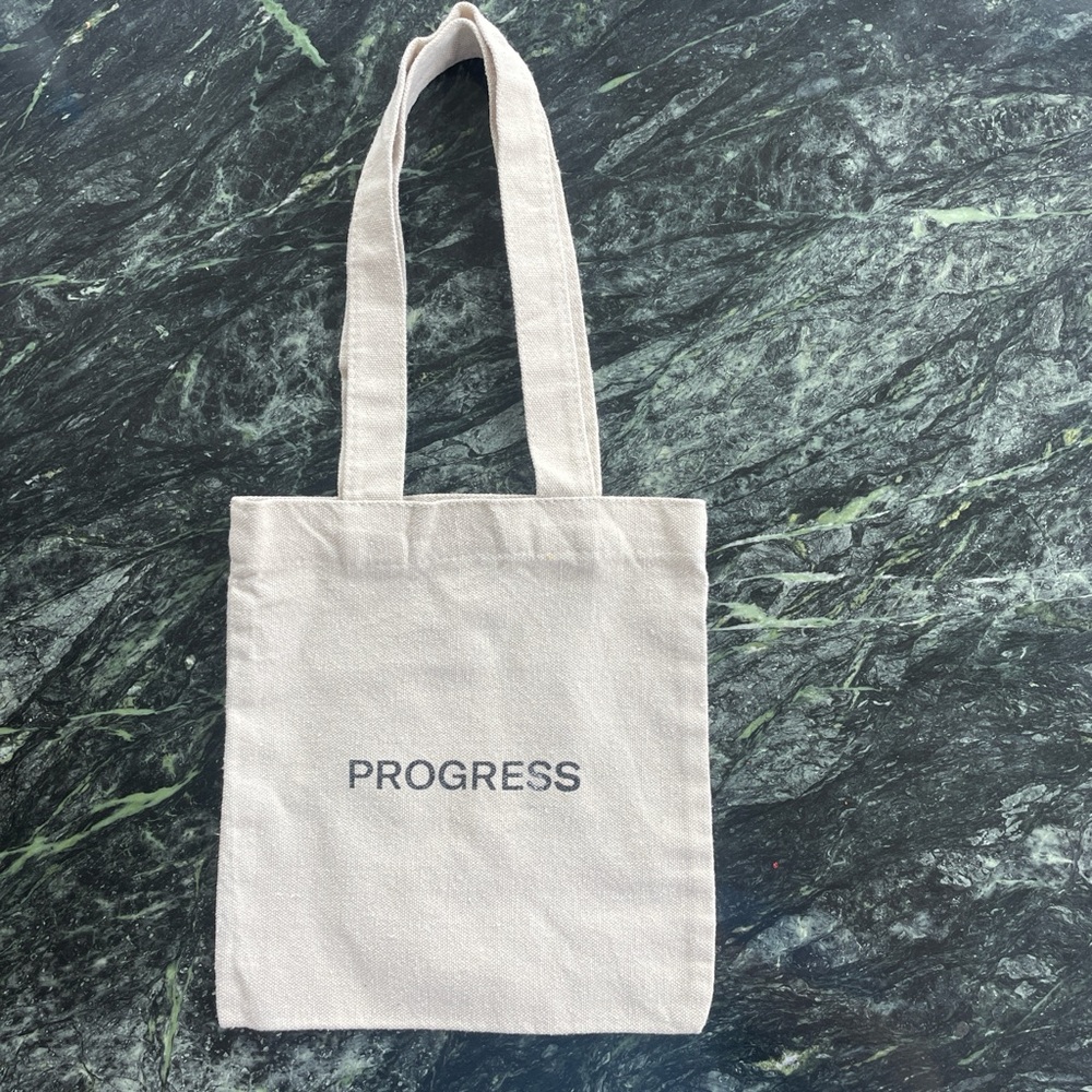 Vintage Small “Progress” Canvas Tote Bag in Beige.